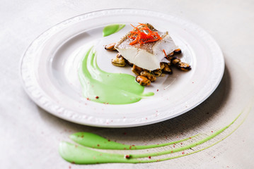 roasted fish steak with mussels