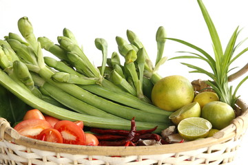 Traditional spices of Thailand, with chili, lime, tomato, basil.