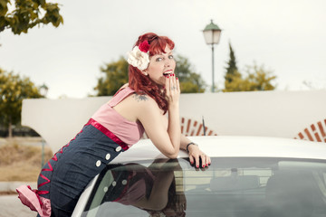 pinup young woman in vintage style clothing