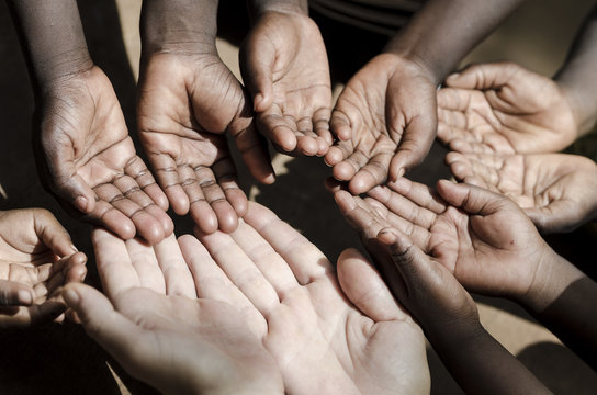 Caucasian and African Ethnicity Hands Asking for Help Symbol