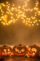 Illuminated carved halloween pumpkins lanterns © Photographee.eu