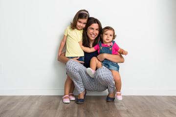 Mother and daughters in studio