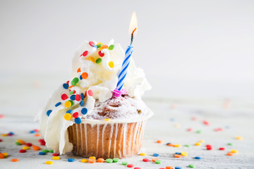 Muffin and holiday candles, birthday