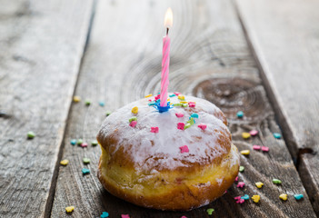 Berlin donuts and festive candle birthday
