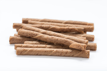 Chocolate wafer sticks isolated on white background.