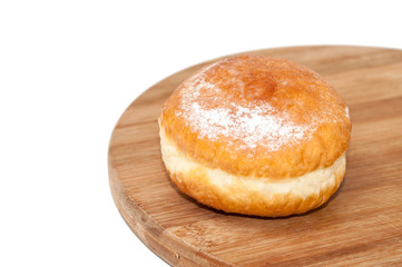 Donut stuffed with vanilla cream