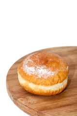 Donut stuffed with vanilla cream