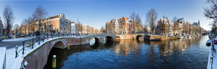 Beautiful winter panorama of the Unesco world heritage city canals of Amsterdam, The Netherlands.