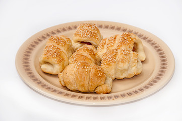 Puff pastry with meat served on the plate