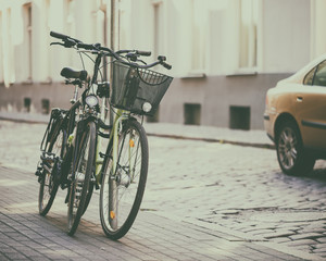 Fototapeta na wymiar Two bicycles on street. Selective focus.