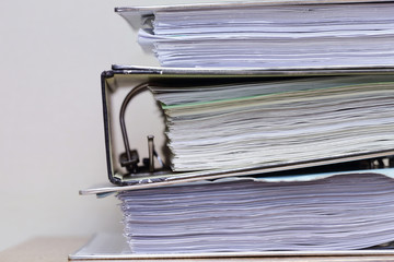 folders of business paper