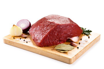 Fresh raw beef on cutting board on white background 