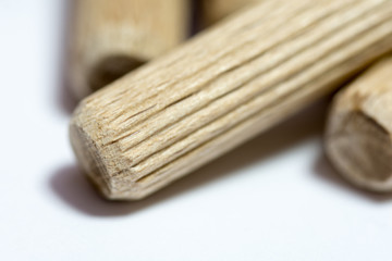 Close macro view of wooden dowels