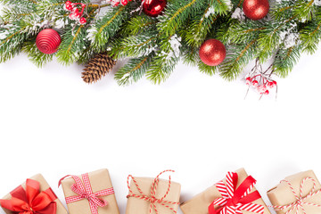 Christmas tree branch with gift boxes
