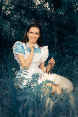Girl Costumed as Alice in Wonderland with The White Rabbit