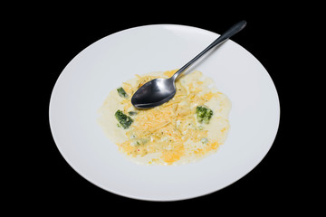 Photo vegetables in creamy sauce on a white plate