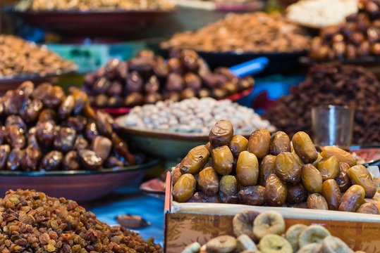 selective focus shot on dates on a moroccan market