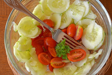 Fresh mixed vegetable salad with cucumber and tomatoes