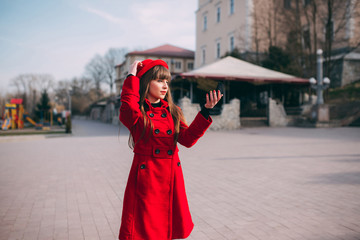 woman in red coat