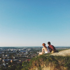 Young pair on a mountain