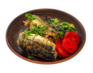 smoked fish with vegetables on a natural clay plate. mackerel
