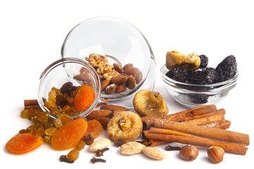 Assortment of spices and dried fruits.