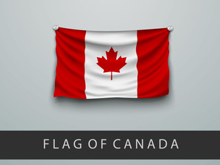FLAG OF CANADA battered, hung on the wall