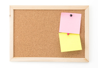 sticky note on cork board