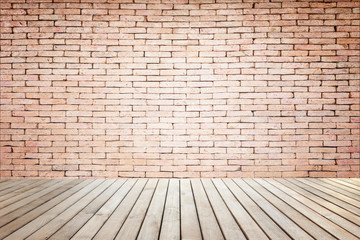 Empty top of wooden floor and natural stone wall