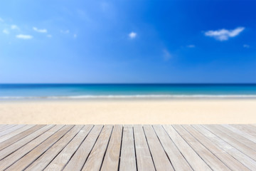 Fototapeta na wymiar Wooden flooring and tropical beach
