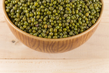 green beans on wood background