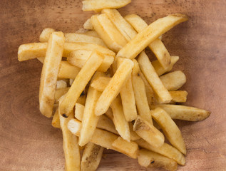 french fries on wood plate