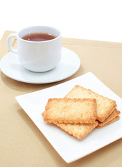 Coconut biscuit and a cup of hot tea
