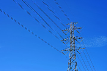 High voltage electric tower on sky background