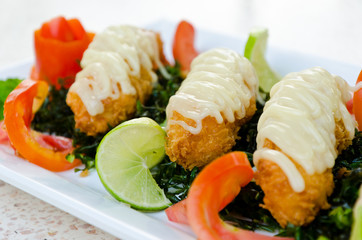 Crispy-fried shrimps with lime sauce