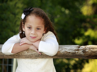 Outdoor portrait of a beautiful African American little girl