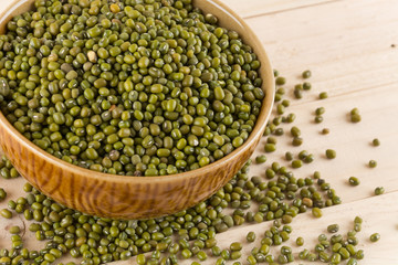 green beans on wood background