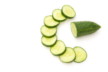 fresh cucumber slices on a white background with copy space