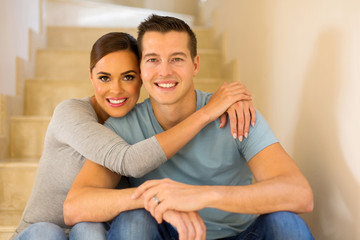 married couple relaxing at home