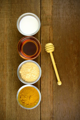 Facial mask with Tanaka(Naringi crenulata (Roxb.) Nicolson),  fresh milk, turmeric powder and honey.