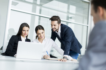 Young people working in the office