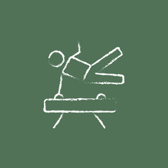 Gymnast on pommel horse icon drawn in chalk.