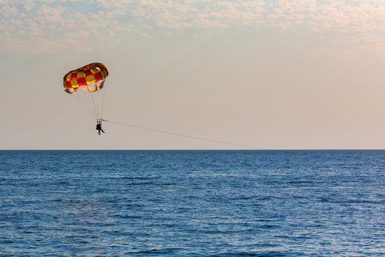 People parasailing over the sea