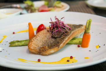 Fried Fish Steak with sauce and veggies