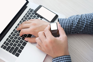Man hands watch and phone laptop with isolated screen