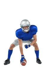 American football player in attack stance