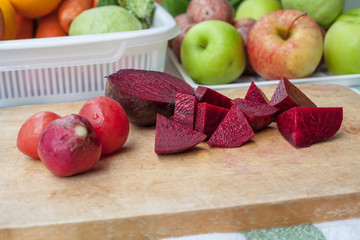 Young beets on wooden table close up