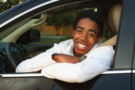 Young man driving a car