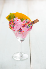 Delicious cup of strawberry ice cream