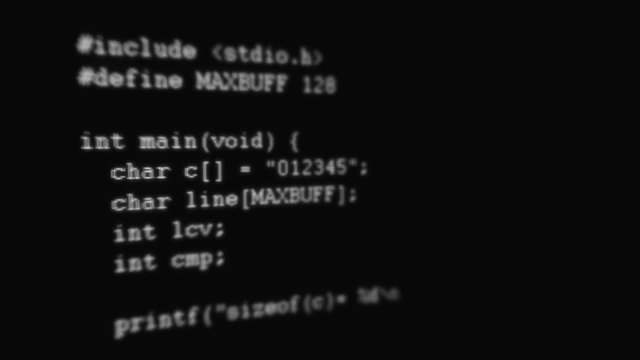 Text coding animation on black background